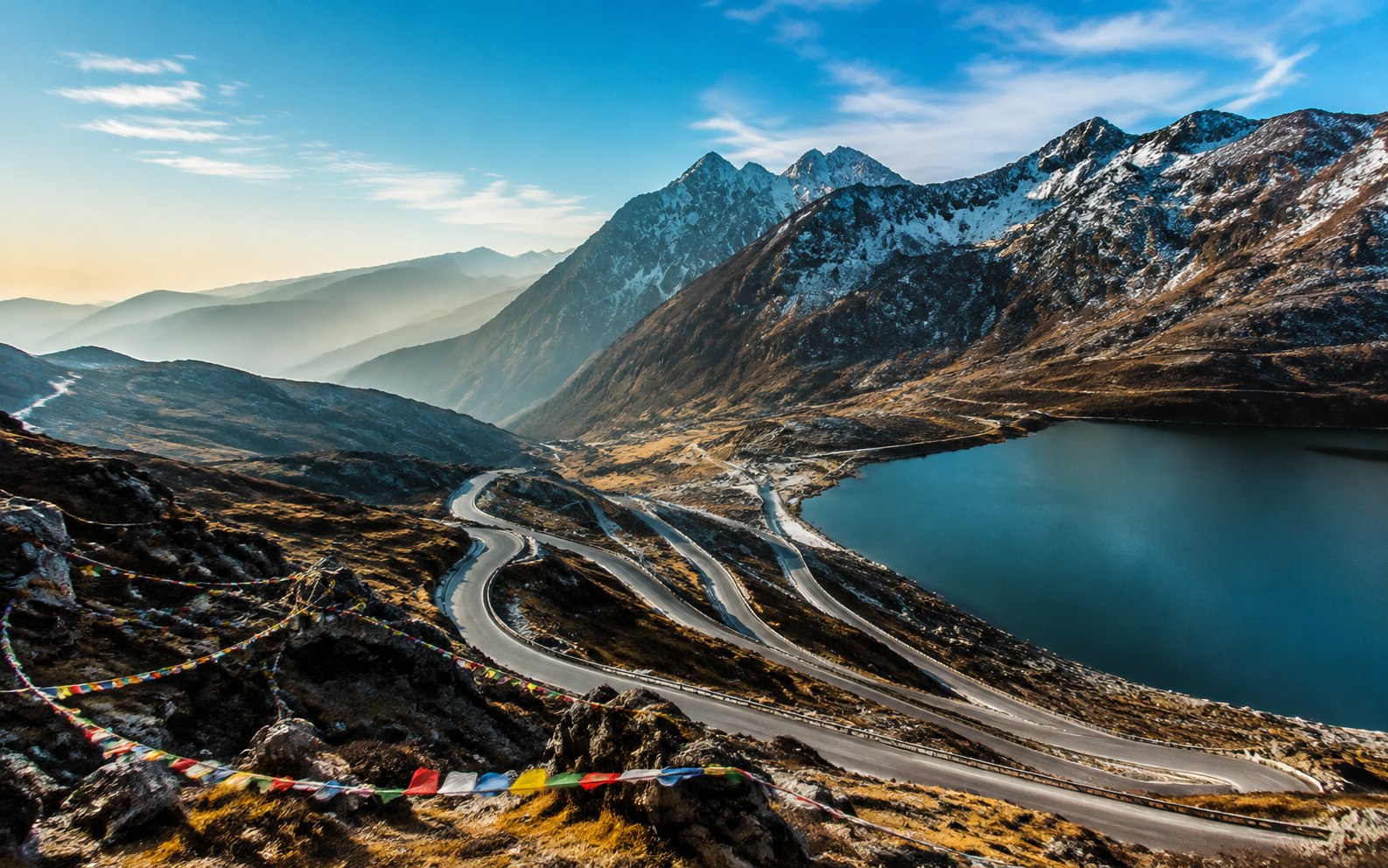 Tsomgo Lake and a mountain road in Sikkim