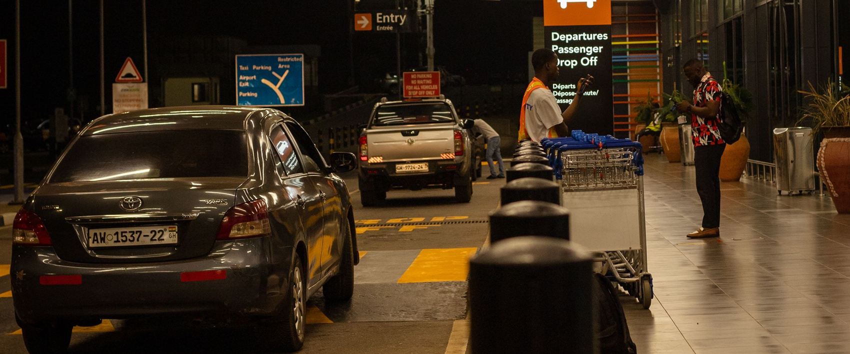 Taxi waiting at an airport pickup point